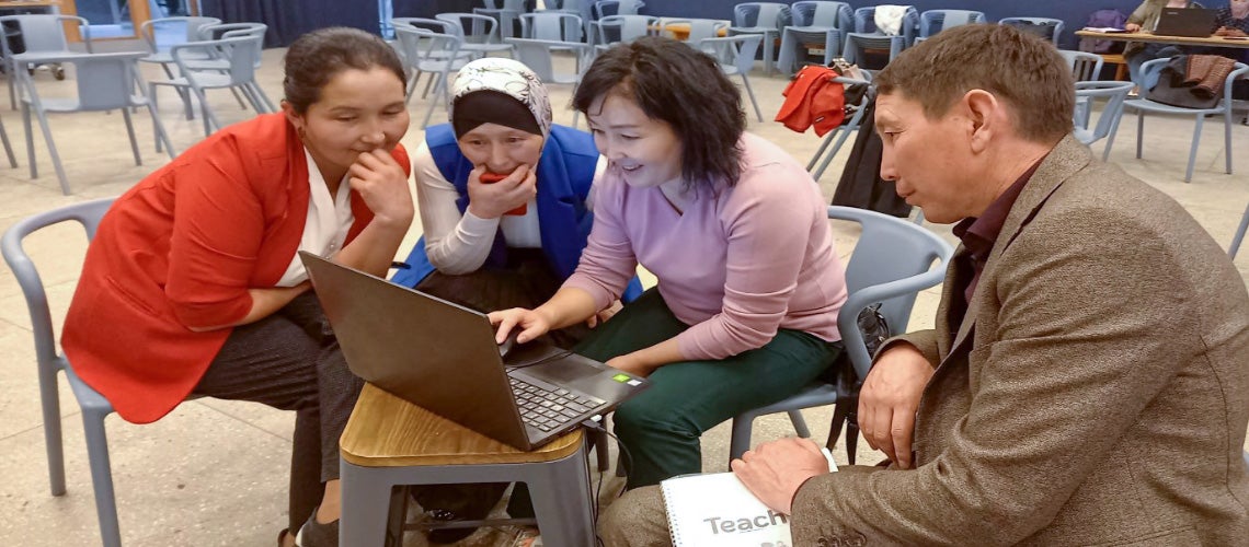 Kyrgyz teachers collaborating during a session with the Mentor Training Program Kyrgyz teachers collaborating during a session with the Mentor Training Program